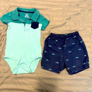 Carter’s Size 24 month matching short and polo style shirt set.